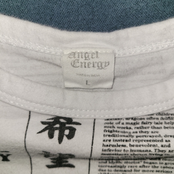 Angel Energy cropped newspaper print shirt with green dragons on it - Picture 3 of 3